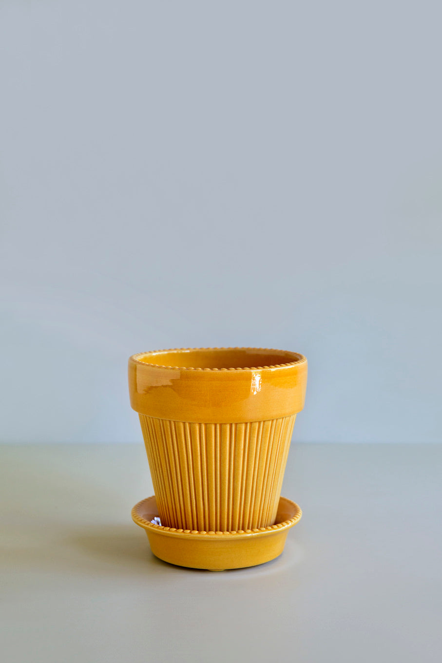 Simona glaserad amber yellow